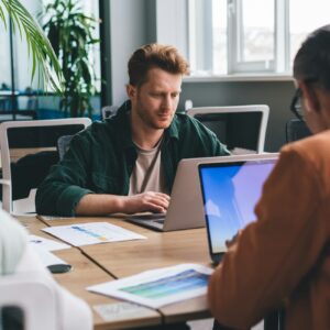 skilled businessman browsing website