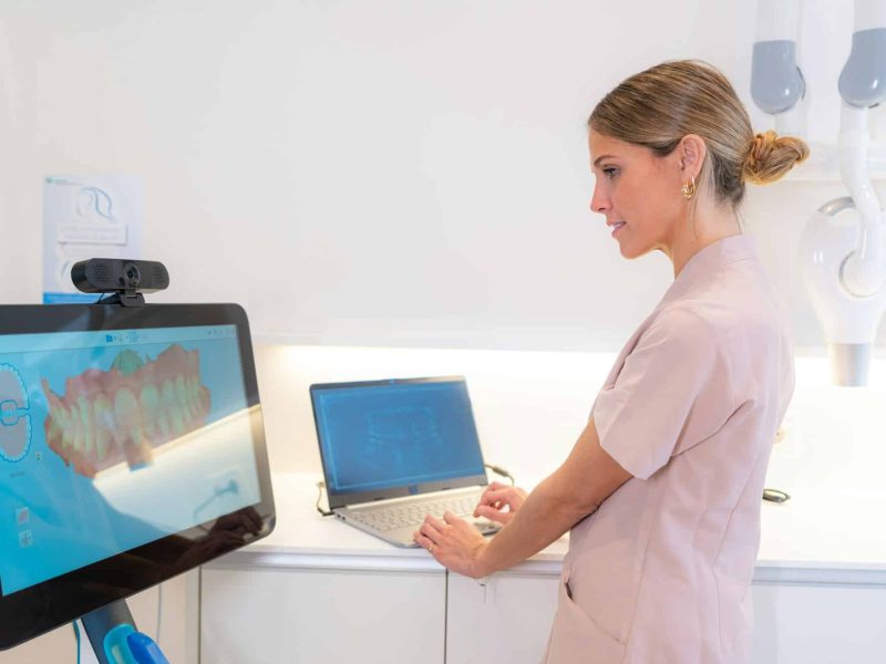 Technician using modern technology in a clinic